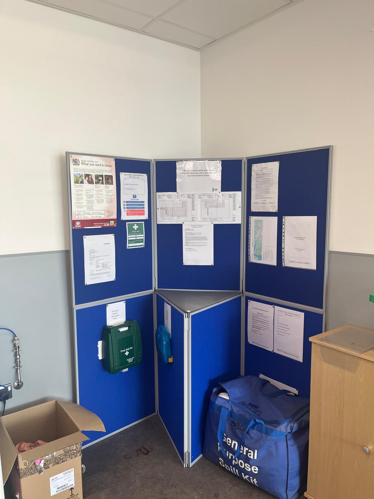 Site health and safety information board and first aid station