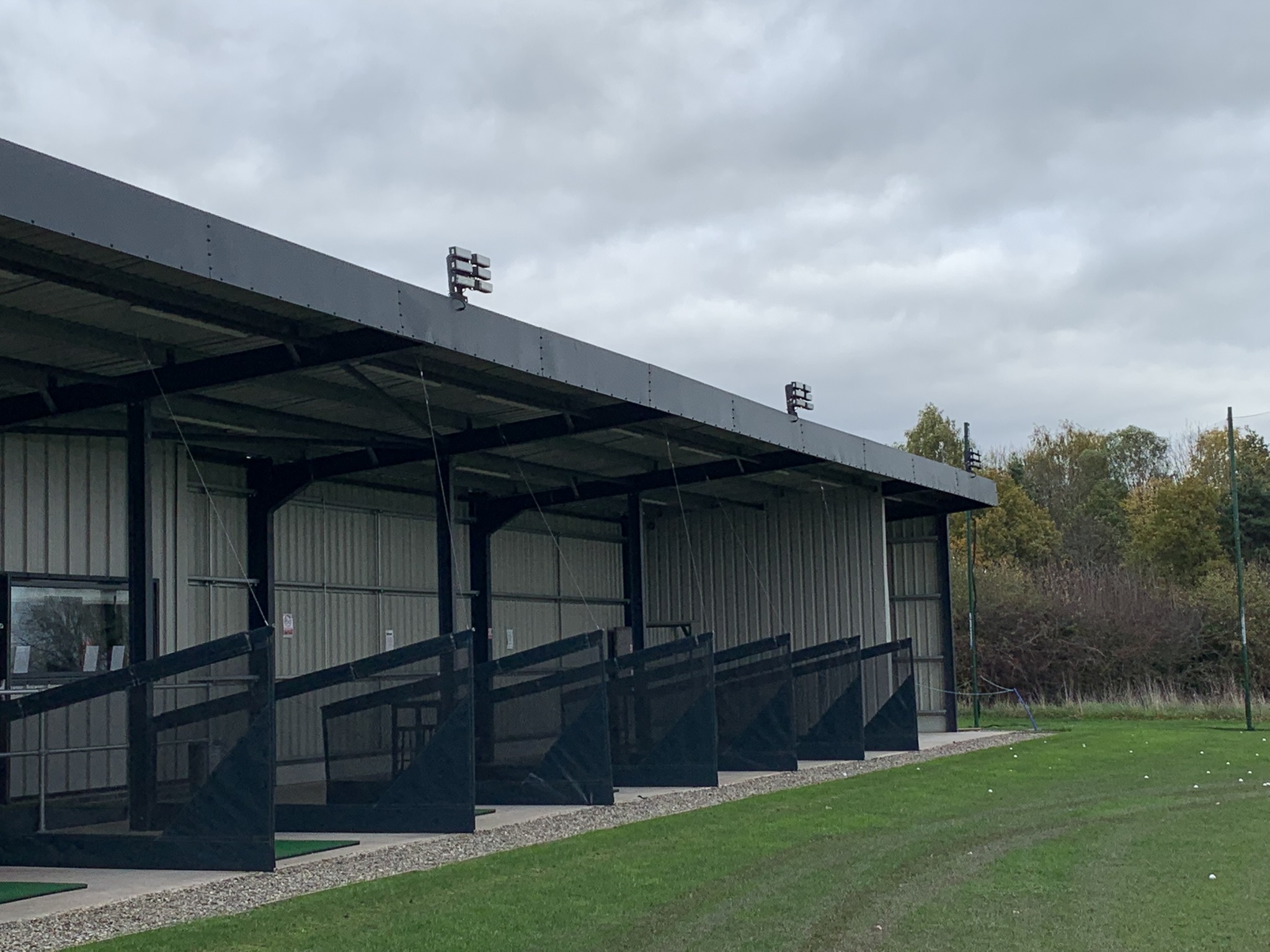 External view of driving range bays and roof mounted equipment