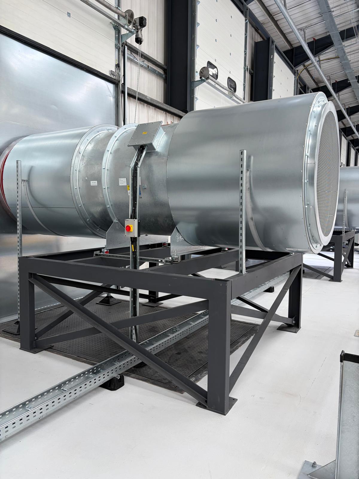 Fan, local isolator and associated electrical containment
